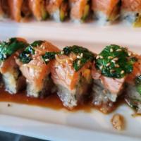 New Style Salmon Roll · Scottish salmon drizzled with yuzu soy, cilantro and minced ginger b4 being flash seared. ro...