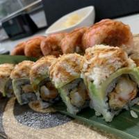 Twister Roll · A house favorite!! tempura Lobster tail inside, Crab mix and avocado on top with eel sauce.