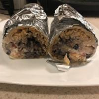 Grilled Spicy Beef Burrito · Mexican rice, beef, and pinto beans in flour tortilla. Packed with spices, Monterey Jack che...