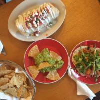 Chicken Chipotle Burrito · Spicy chipotle sauce with mexican rice, pinto beans, Monterey Jack cheese, pico de gallo, an...