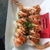 James Dean Roll · Shrimp tempura, crab salad and cream cheese topped with fresh avocado, salmon, teriyaki, spi...