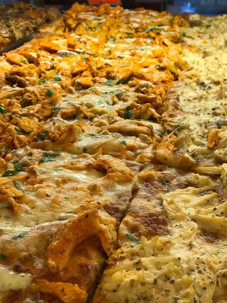 Chicken Buffalo Pizza · Marinated chicken with spicy Buffalo sauce and ranch, part-skim mozzarella cheese and chopped parsley.