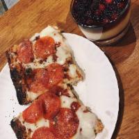 Pepperoni Pizza · Organic tomato sauce, part skim mozzarella and pepperoni.