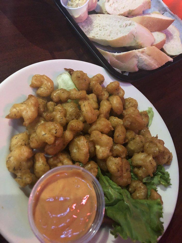 Popcorn Shrimp · Tender shrimp tossed in our Cajun seasoned batter, fried ’til golden and served with Hazel dressing.