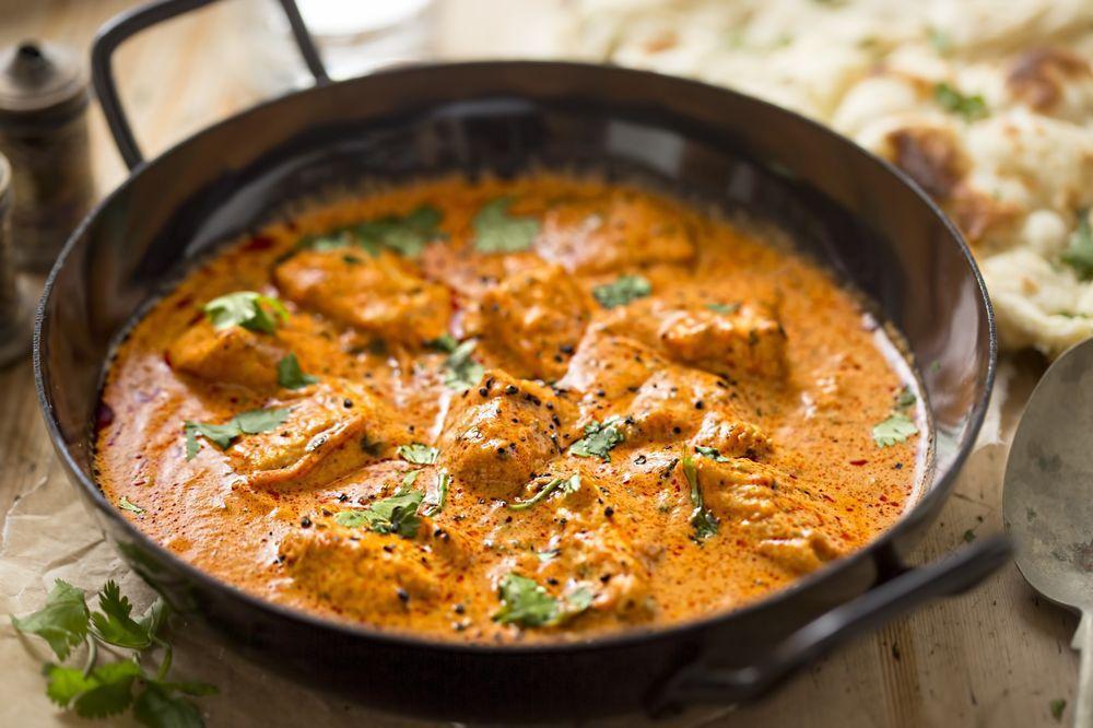 Chicken Tikka Masala · Marinated boneless chicken cubes baked in clay oven and then cooked in creamy onion and tomato sauce with the perfect combination of Himalayan herbs and spices. Served with basmati rice or butter naan.