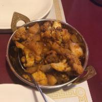 Aloo Gobi · Cauliflower & potato cooked in onion and tomato sauce in combination with Himalayan herbs & ...