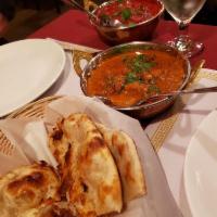 Lamb Tikka Masala · Marinated boneless lamb baked in clay oven and then cooked in creamy onion and tomato sauce ...
