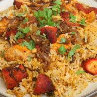Himalayan Chicken Biryani · Boneless Chicken cooked with Basmati Rice in a perfect combination of
Himalayan herbs & spic...