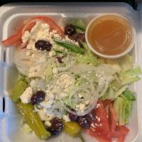 Greek Salad · Lettuce, tomato, onions, Kalamata olives, feta cheese, peperoncini. Add grilled chicken for ...