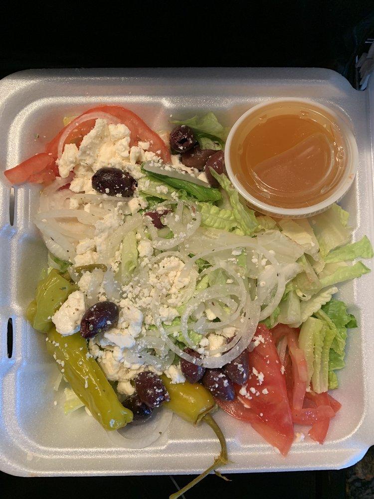 Greek Salad · Lettuce, tomato, onions, Kalamata olives, feta cheese, peperoncini. Add grilled chicken for an extra charge.