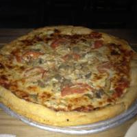 Chicken Delight Pizza · Chicken, fresh tomatoes, mushrooms, garlic and onions.