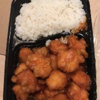 Sesame Chicken · Breaded fried white meat chicken with sesame seeds and broccoli 