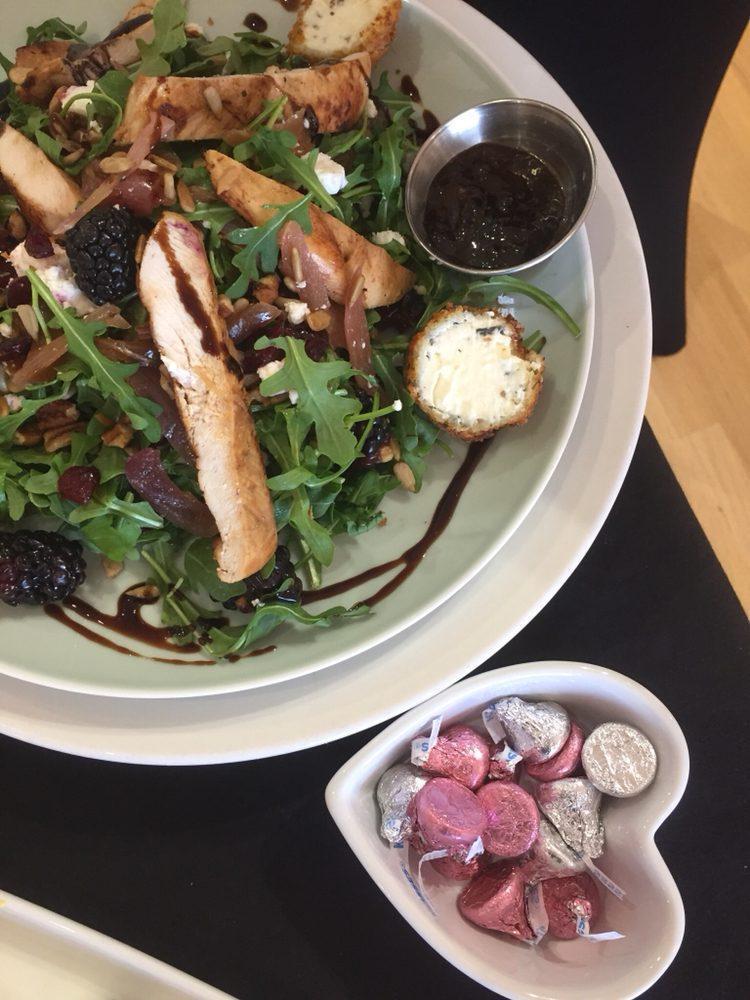 Forsyth Fig Salad · Sweet tea brined chicken, fried goat cheese with rosemary and honey, cranberry, seasonal berries, pecans and sunflower seeds, with balsamic glaze, served with rosemary fig balsamic dressing over arugula, topped with red onion marmalade.