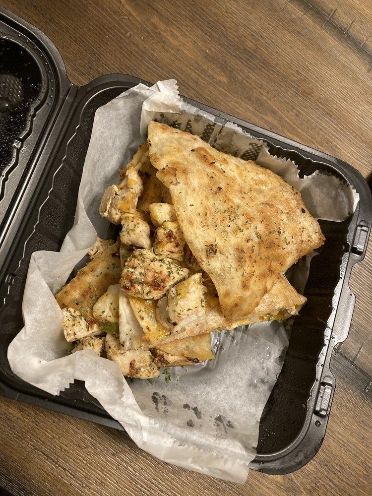 Chicken Quesadilla · Grilled chicken, peppers, onions, and cheese.