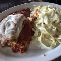 Lasagna · Ground beef, ricotta, Parmesan and mozzarella cheese, red sauce.