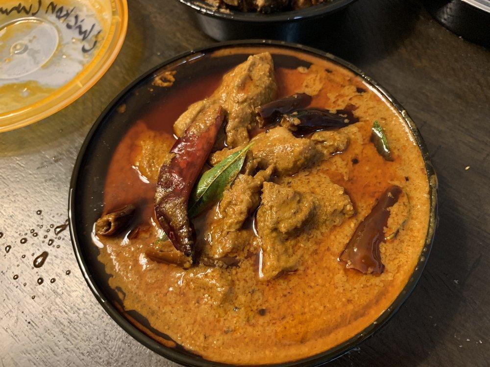 Chicken Curry · Indian style chicken curry cooked with traditional spices.