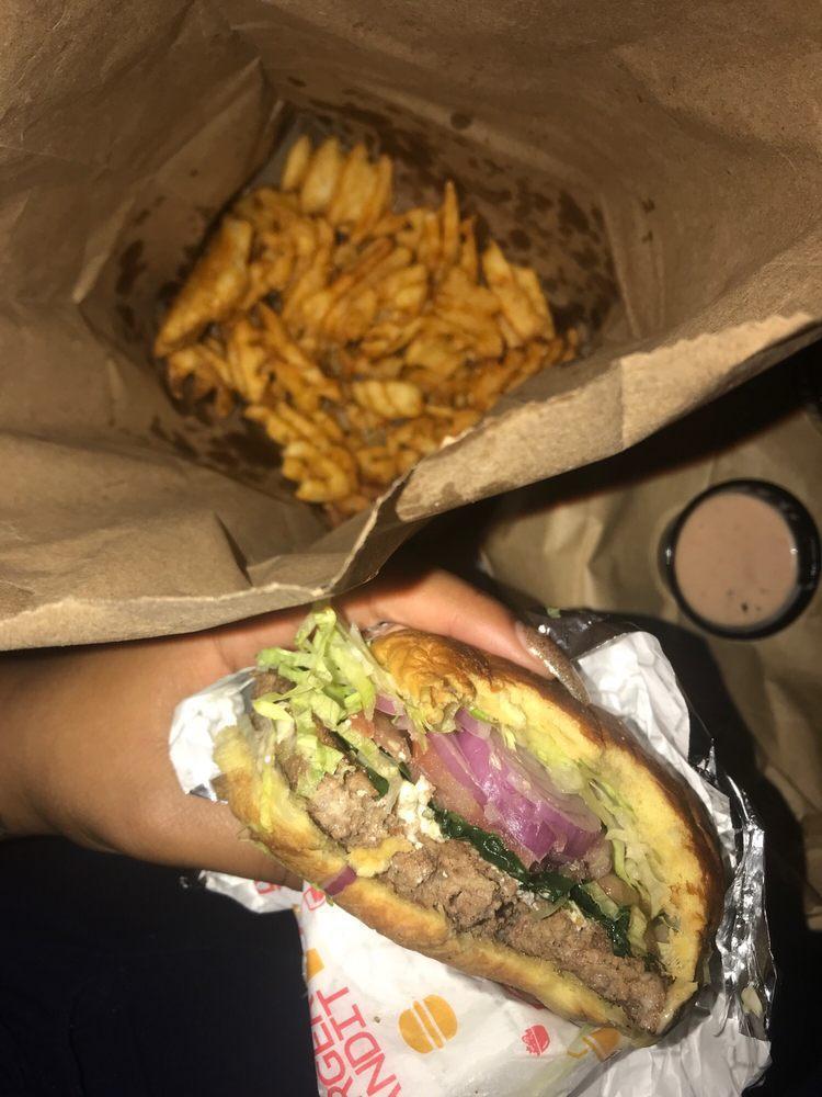 Greek God Burger · Sauteed spinach, feta cheese, tomato, red onion, and garlic aioli.