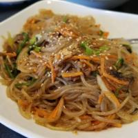 Japchae · Glass noodles, red pepper, carrots, onions, spinach, mushrooms and thinly sliced marinated b...