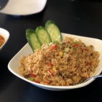 House Fried Rice · Fried rice, eggs, red bell pepper, onions and Bonchon soy garlic sauce.