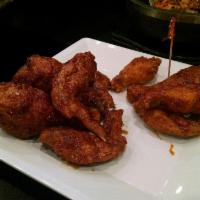 Fried Chicken Wings · Served with your choice of spicy, soy garlic or half spicy and half soy garlic sauce. Served...