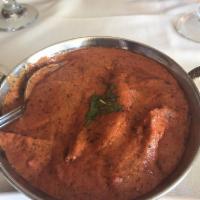 Butter Chicken · Boneless dark meat chicken roasted in a clay oven and then cooked in creamy tomato sauce. Se...