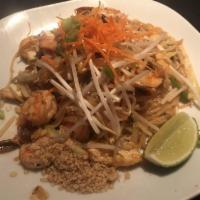 Pad Thai · The famous Thai noodle dish, thin noodles stir-fried with egg, bean sprouts, onions, and top...