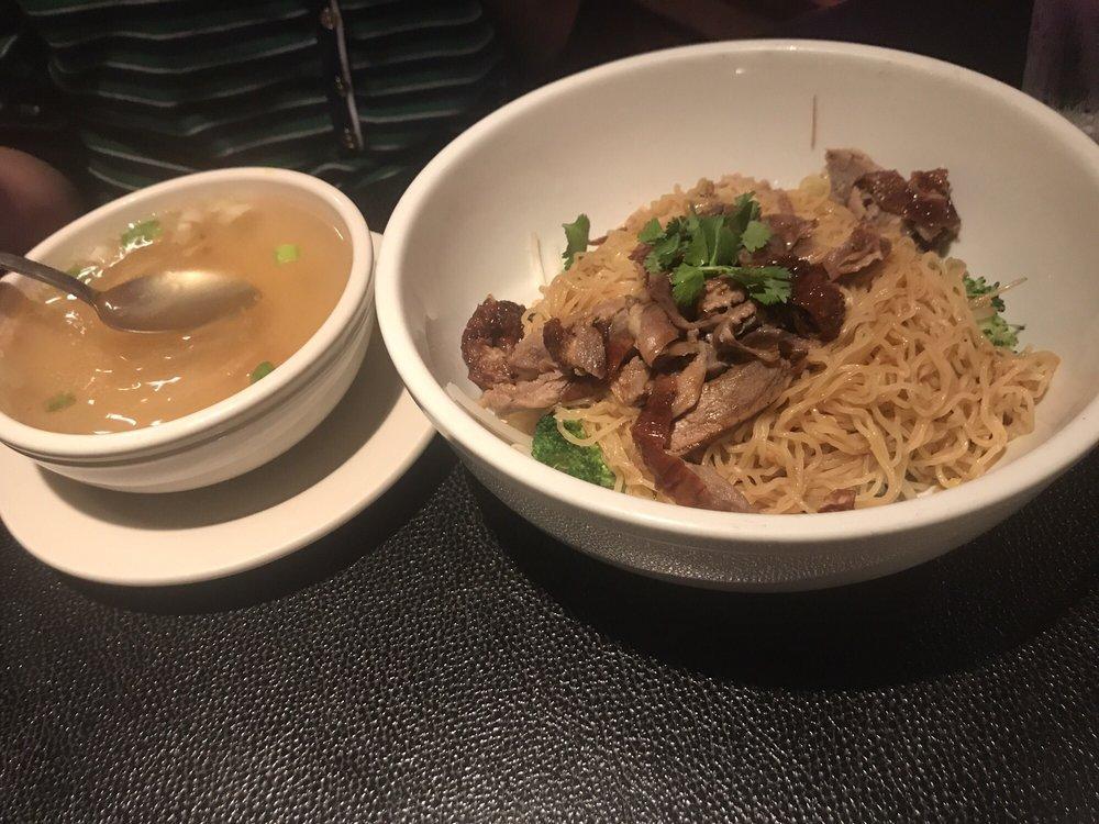 Roast Duck Noodles · Egg noodles with garlic, green onion and broccoli topped with roasted duck.