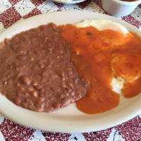 Huevos Rancheros · Fried or scrambled eggs with Tecate sauce on top.