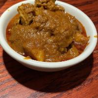 Lamb Vindaloo · Cooked with fresh ground Indian spices, vinegar and potato. Served with rice.