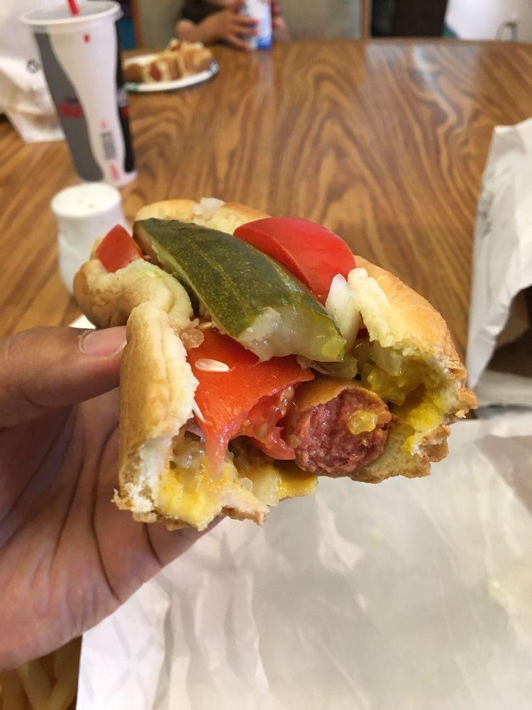 Chicago Dog · Mustard, relish, onions, tomatoes, chili peppers, pickle and celery salt.
