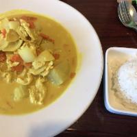 Yellow Curry · Your choice simmered in coconut milk with carrots, onions and potatoes.