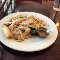 Drunken Noodles · Wide rice noodles, bean sprouts, bell pepper, broccoli, cabbage, carrots, onions and Thai ba...