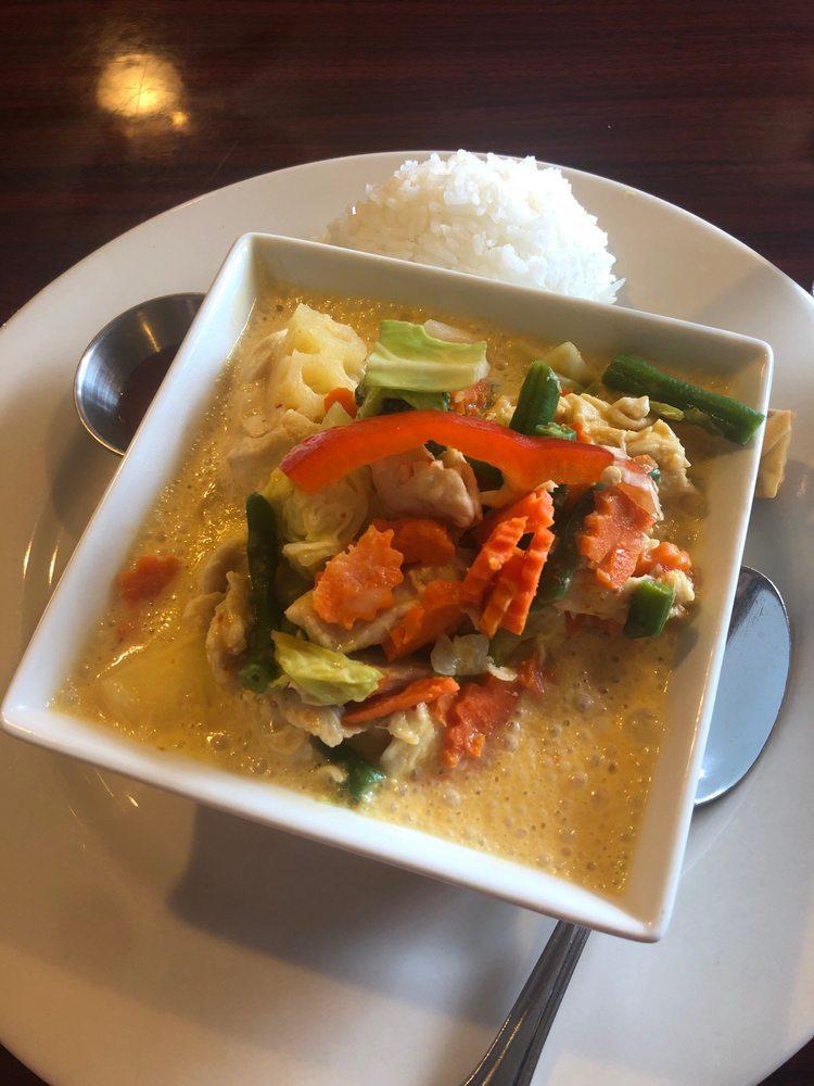 Pineapple Curry · Your choice simmered in coconut milk with Red Curry, bell peppers, green beans and pineapples.