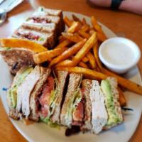 California Club Sandwich · Triple decker with turkey, bacon, avocado, lettuce, tomatoes and mayo between toasted wheat ...