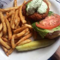 Homemade Veggie Burger · Breaded and fried, topped with avocado and jalapeno tartar sauce. Served on toasted brioche ...