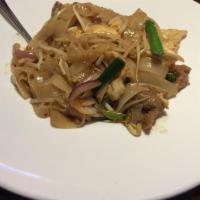 Combination Drunken Noodles · Stir-fried wide rice noodles with jumbo shrimp, beef, chicken, with spicy chili sauce, basil...