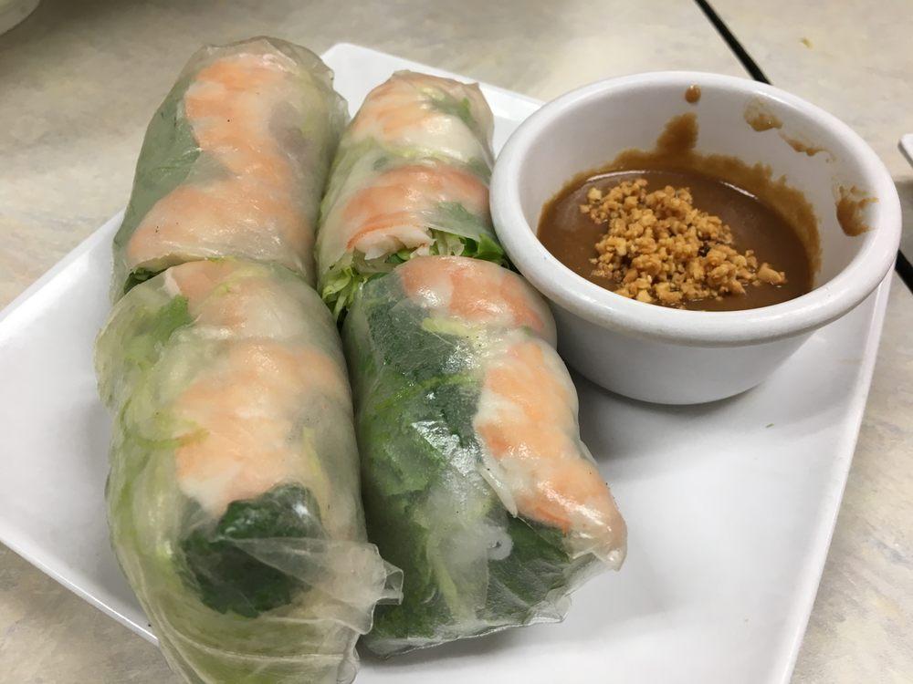 Goi Cuon · 2 pieces. Steam pork and shrimp wrap with rice paper with peanut sauce.