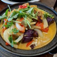 Eggplant Curry Claypot · Organic tofu, eggplant, onion and bell pepper in coconut curry sauce.
