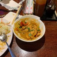 Vietnamese Yellow Curry · with bell peppers, onions, carrots, broccoli