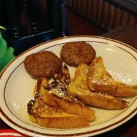 French Toast · 2 slices of Texas toast served with bacon or sausage and side order of fresh fruit.