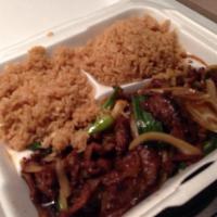 Mongolian Beef · Sliced tender beef seared with onions, scallions in special mongolian sauce. Served with fri...