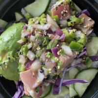 Spicy Tuna Poke · White rice, red sweet onions, cucumber, cilantro, jalapenos, green onions, black sesame seed...
