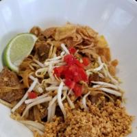 Pad Thai Noodle · Rice noodles, scallions, bean sprouts, eggs, red pepper, crushed peanuts in Thai sauce, garn...