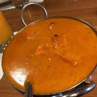 Chicken Tikka Masala · Tandoor chicken breast, cooked with bell peppers, cashew nuts, onion, fresh tomatoes, cream,...