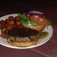 Vegan Burger · Beyond™ meatless patty with spring lettuce, fresh sliced tomato, and pickled red onion. Serv...