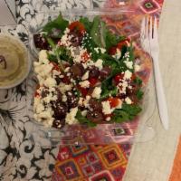 Greek Salad · Fresh spring mix, red onions, fire roasted red peppers, kalamata olives and feta cheese. Mad...