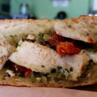 Tuscan Grilled Chicken Panini Sandwich · Grilled chicken breast, melted provolone, sun-dried tomatoes and homemade pesto.