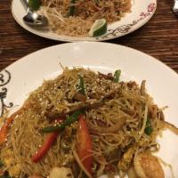 Pad Thai · Wok fried thin rice noodles, eggs, bean sprouts, chives, tamarind sauce. With a choice of be...
