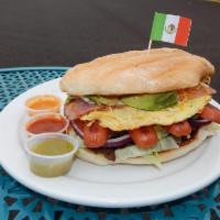 Torta · Lightly grilled Mexican roll filled with choice of meat, lettuce, tomato, onion, jalapenos, ...