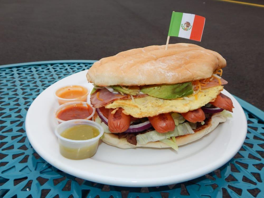 Torta · Lightly grilled Mexican roll filled with choice of meat, lettuce, tomato, onion, jalapenos, mayo and avocado.